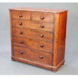A Victorian mahogany D shaped chest of 2 short and 4 long drawers with turned handles 121cm h x