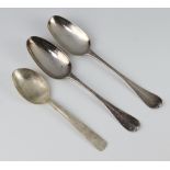 A pair of early Georgian silver table spoons, Old English pattern and a later ditto 160 grams