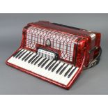 A German Galotta "Ideal" piano accordion, 120 bass, 41 keys, 3 reeds and 5 couplers, complete with 2