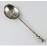 A Charles I style silver seal top spoon, engraved ? B L F 66, 52.4 grams, 18cm, rubbed makers