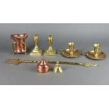 A 19th Century squat brass candlesticks raised on square bases 12cm h x 7cm, pair of brass
