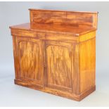 A Victorian mahogany chiffonier with raised back, fitted 2 drawers above cupboard enclosed by a