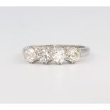 A white metal stamped plat. 4 stone diamond ring, 1.25ct, size O, 4.6 grams