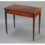 A 19th Century mahogany side table fitted a drawer with replacement ring drop handles, raised on