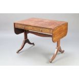 A 19th Century mahogany sofa table with ebony stringing fitted 2 drawers, raised on standard end