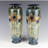 A pair of Royal Doulton vases decorated with stylised flowers 35cm