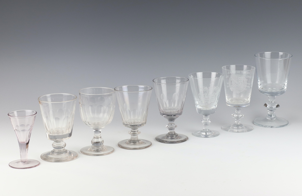 An engraved presentation glass goblet and 7 other glasses