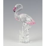 A Swarovski Crystal figure of a flamingo by Gabriele Stamey no.289733/76000003, 15cm, boxed and with