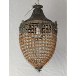 A pressed metal and wire drop light fitting 54cm x 36cm, some corrosion in places