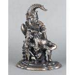 A Victorian style cast iron door stop in the form of a seated Mr Punch 30cm x 23cm x 9cm