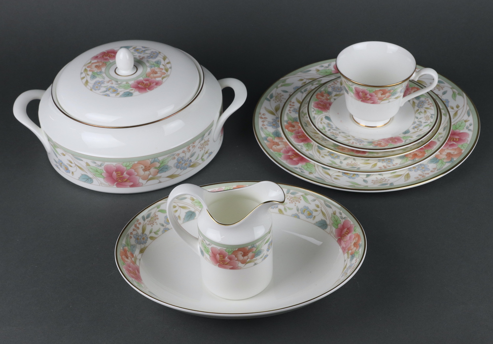 A Royal Doulton Claudia pattern part tea and dinner service comprising 10 tea cups, 10 saucers, 11