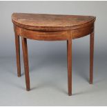 A Georgian mahogany tea table raised on square tapered supports 75cm h x 89cm w x 44cm d Top is