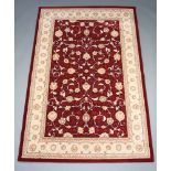 A tan and white ground machine made North West Persian style rug 208 cm x 133