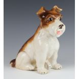 A ceramic figure of a seated terrier 27cm