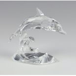 A Swarovski Crystal figure of a dolphin by Michael Stamey 7644000001 8cm with box and certificate
