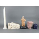 A carved stone obelisk 54cm h x 9cm x 9cm (some chips in places), a rectangular carved stone