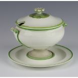 A 19th Century Wedgwood sauce tureen and cover with floral finial and scroll handles 17cm