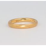 A yellow metal 22ct wedding band size L, 4.8 grams
