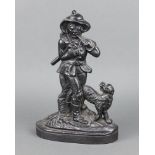 A Victorian cast iron doorstop in the form of a standing woodsman and dog 32cm h x 22cm x 6cm