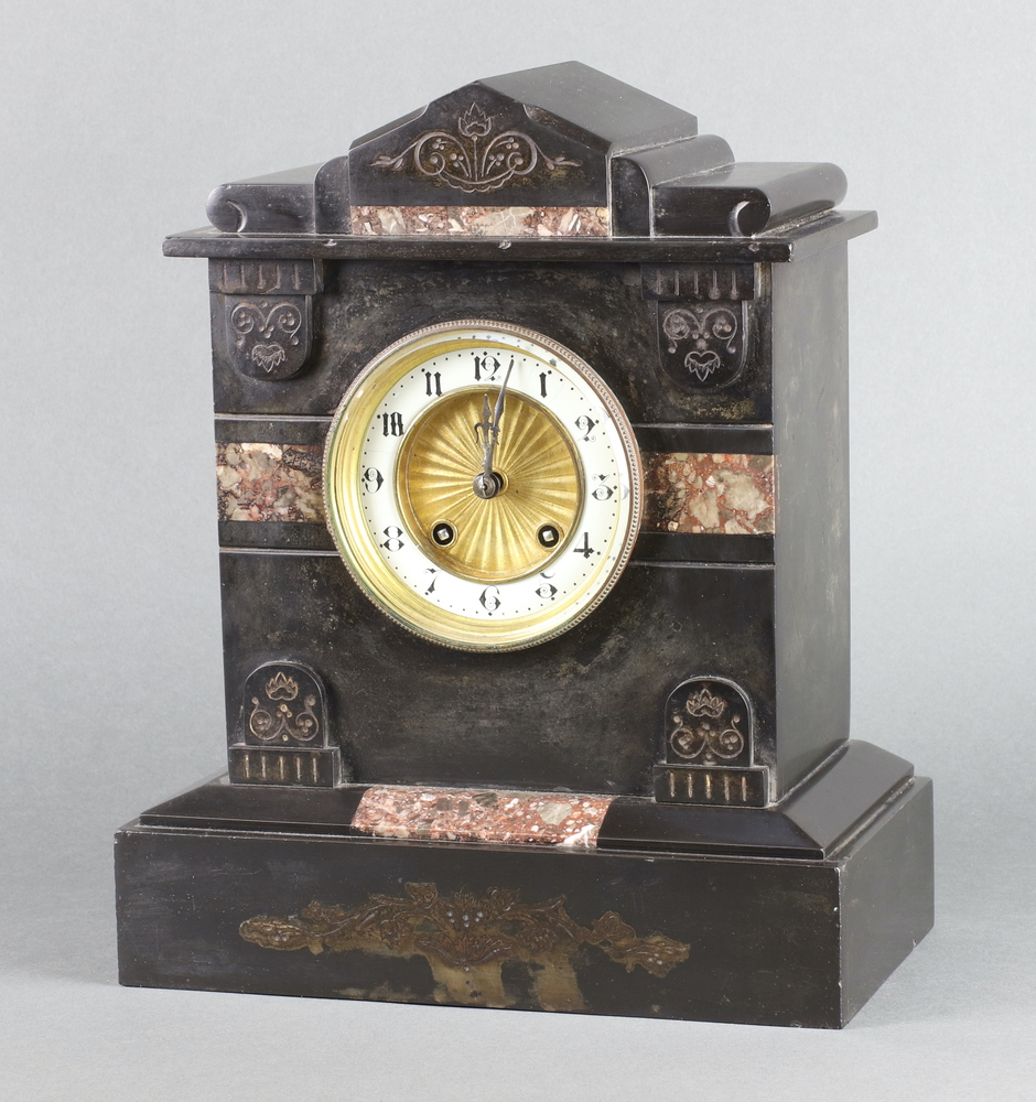 A Victorian French 8 day striking mantel clock with enamelled dial and Arabic numerals, contained in