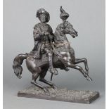 A Victorian bronze figure of a mounted nobleman with baton, raised on a rectangular naturalistic