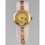 A lady's 9ct yellow gold wristwatch on an expanding bracelet 17.3 grams gross including movement and