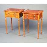 A pair of Georgian style crossbanded mahogany lamp/bedside tables, each fitted 2 drawers, raised