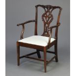 A child's Edwardian Chippendale style carved mahogany open armchair with upholstered drop in seat