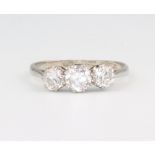 A white metal 18ct 3 stone diamond ring approx. 2.5 grams, 1.0ct, size Q
