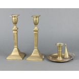 A pair of Adam style reeded brass candlesticks on square bases with detachable sconces 26cm h x 10cm