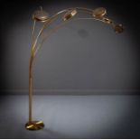 A BRASS FLOOR LAMP