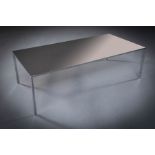 A POLISHED CHROME LOW TABLE