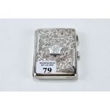 AN EDWARDIAN RECTANGULAR SILVER AIDE MEMOIRE with foliate engraved decoration,