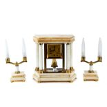 A 20th CENTURY FRENCH WHITE ONYX ART DECO PERIOD CLOCK GARNITURE,