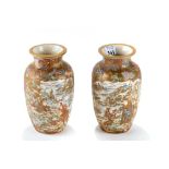 A PAIR OF FINE QUALITY JAPANESE MEIJI PERIOD SATSUMA POTTERY VASES decorated with figures and