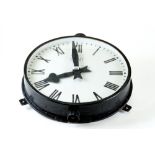A VINTAGE "GENT" CIRCULAR ELECTRIC WALL CLOCK with black painted case, 18 1/2" diameter.