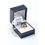 A 9CT GOLD SAPPHIRE AND DIAMOND STAR-HEAD RING, with fluted shoulders, size M,