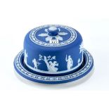A 19th CENTURY WEDGWOOD BLUE AND WHITE JASPER-WARE CHEESE DISH of circular form,