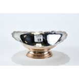 AN ELIZABETH II OVAL SILVER PEDESTAL BOWL with shaped foliate rim, Maker: Mappin & Webb,