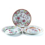 THREE 18th CENTURY CHINESE FAMILLE-ROSE PORCELAIN PLATES all floral decorated, 9", 9",