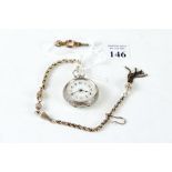 A LATE VICTORIAN CONTINENTAL WHITE METAL KEYWIND OPEN FACE FOB WATCH with gilt outlined enamel dial,