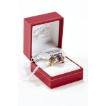 A 9CT GOLD AMETHYST AND DIAMOND RING, size P, and a 9ct gold cabochon amethyst RING, size O,