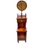 A LATE VICTORIAN MAHOGANY SHAVING STAND, the adjustable circular mirror above a single drawer,