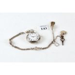 A VICTORIAN CONTINENTAL WHITE METAL KEYWIND OPEN FACE FOB WATCH,