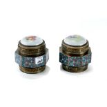 A PAIR OF 19th CENTURY CHINESE OCTAGONAL BRONZE/BRASS JARS AND COVERS with blue ground champleve