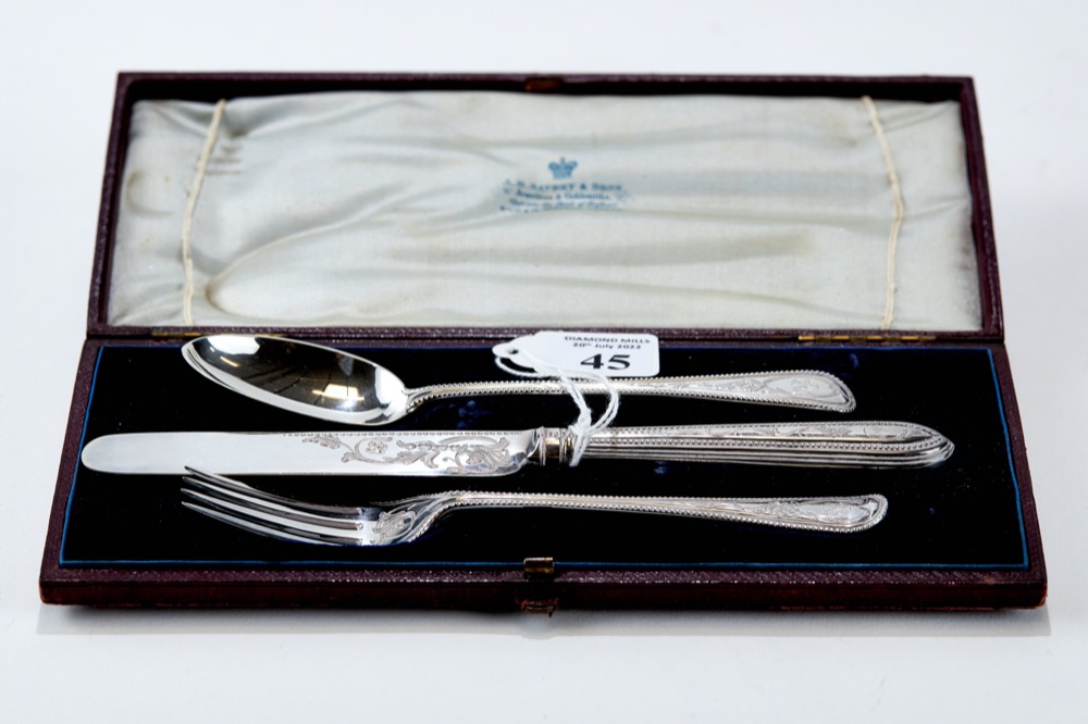 A VICTORIAN FOLIATE ENGRAVED SILVER THREE-PIECE CHRISTENING SET, maker: G.A.