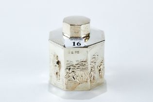 A GEORGE V OCTAGONAL SILVER TEA CADDY AND COVER with embossed figure and landscape decoration,