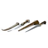 AN ANTIQUE EASTERN DAGGER with pique wooden grip,