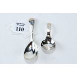 A GEORGE III SILVER CADDY SPOON, pear shaped bowl and engraved crest, maker: WB,