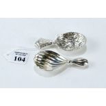 A 20th CENTURY ITALLIAN CAST WHITE METAL CADDY SPOON and a ditto CADDY SPOON of textured design,